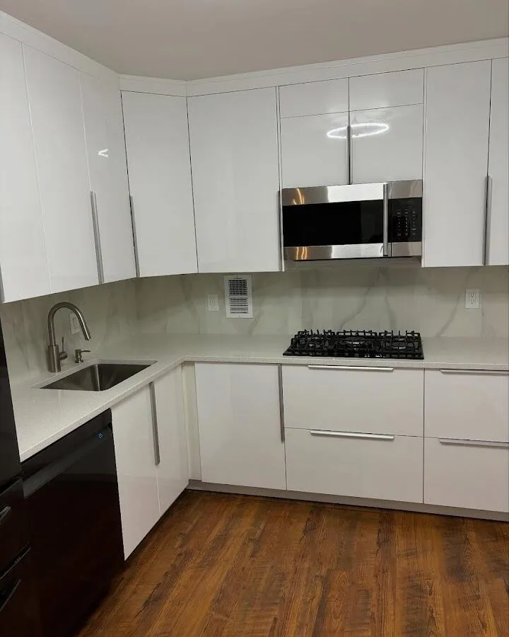 Restored kitchen with white cabinets after water damage in Keansburg